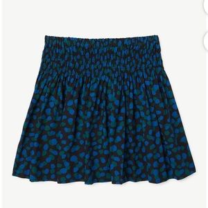 Girls smocked waist skirt is easy to layer and so cool for Spring and summer!